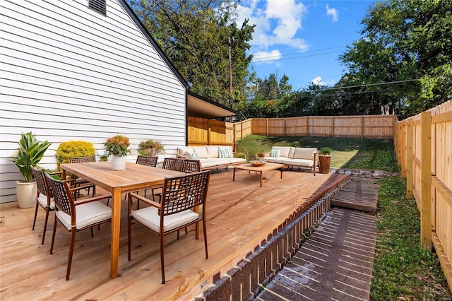 wooden deck featuring an outdoor hangout area