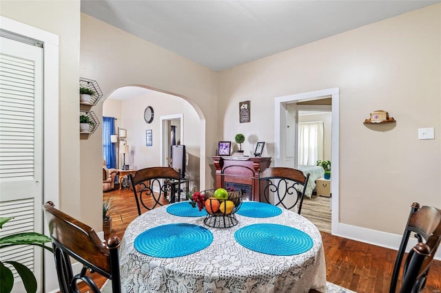 dining space featuring hardwood / wood-style floors