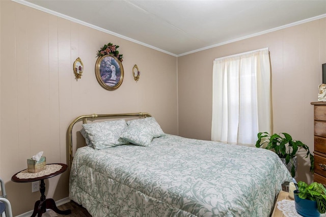 bedroom with wood walls and ornamental molding