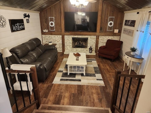 living room featuring wooden ceiling, lofted ceiling, wooden walls, and dark hardwood / wood-style floors