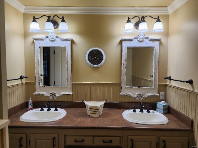 bathroom with vanity and ornamental molding