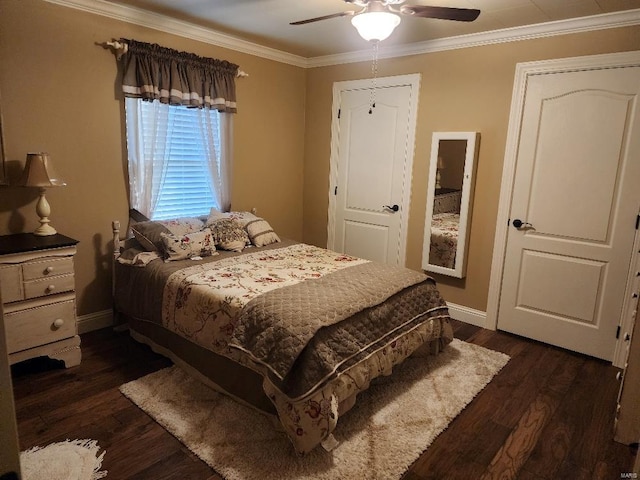 bedroom featuring dark wood-type flooring, crown molding, and ceiling fan