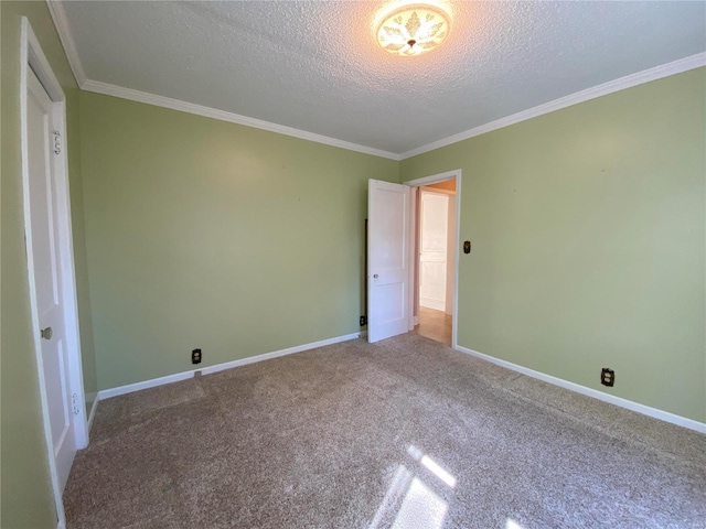 unfurnished bedroom featuring carpet, crown molding, and a textured ceiling