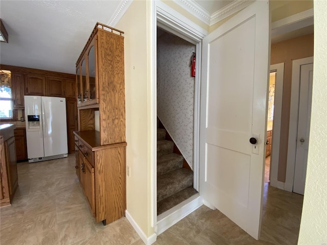 stairs featuring ornamental molding