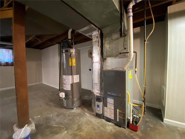 utility room featuring gas water heater