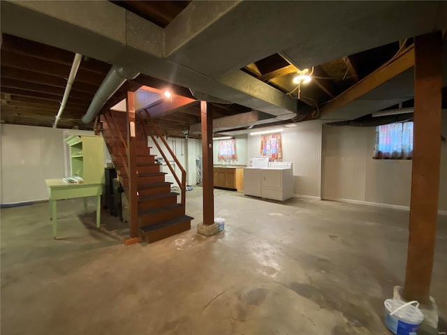 basement featuring separate washer and dryer