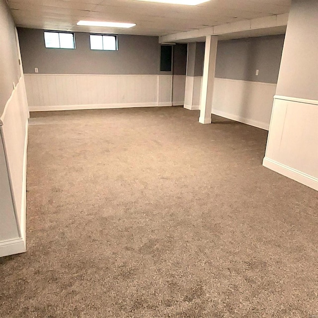 basement with dark carpet