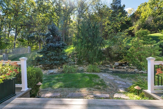 view of yard featuring a wooden deck