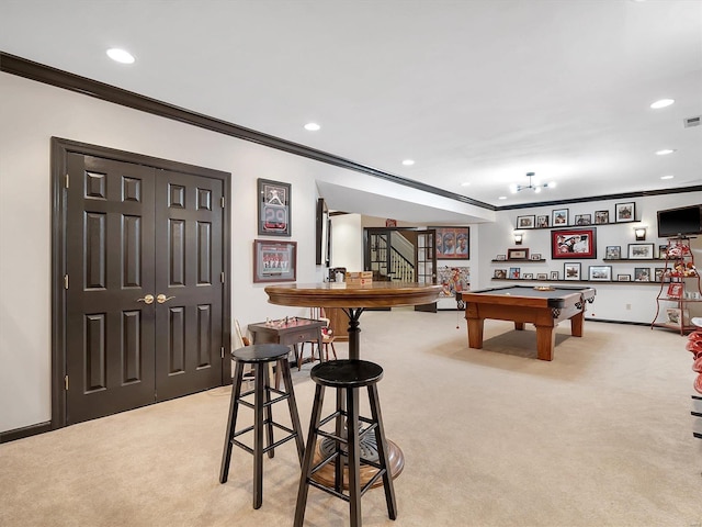 playroom with crown molding, pool table, and light colored carpet