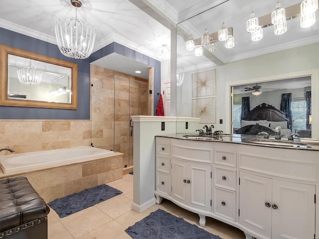 bathroom featuring vanity, shower with separate bathtub, ornamental molding, and tile patterned flooring