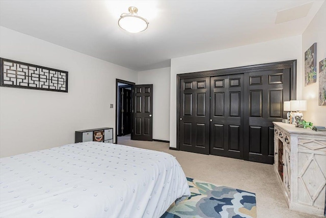 carpeted bedroom featuring a closet