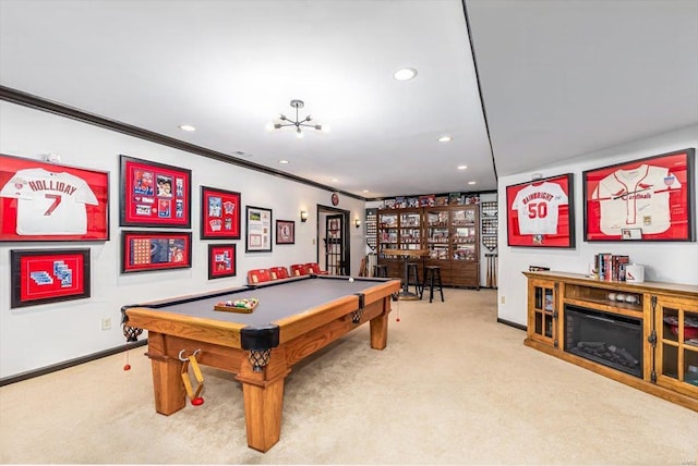 playroom with crown molding, light carpet, and pool table