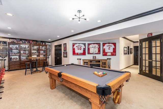 playroom featuring crown molding, bar area, carpet floors, and french doors