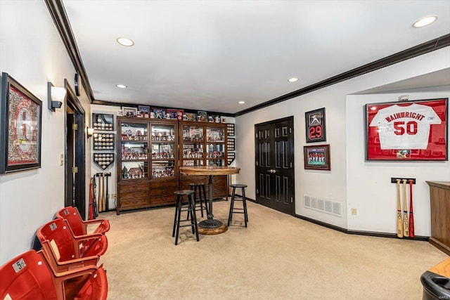 bar with ornamental molding and light colored carpet