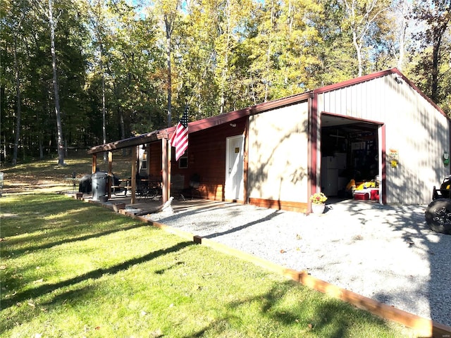 view of outdoor structure with a yard