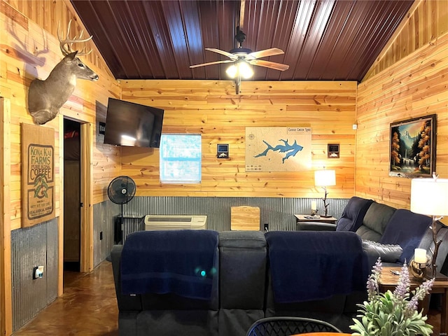 living room with wooden walls and vaulted ceiling