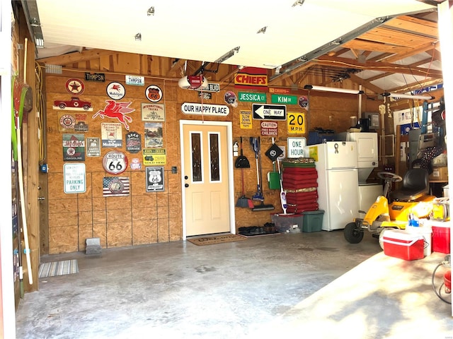 garage with white refrigerator