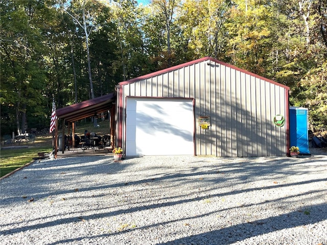 garage featuring a carport