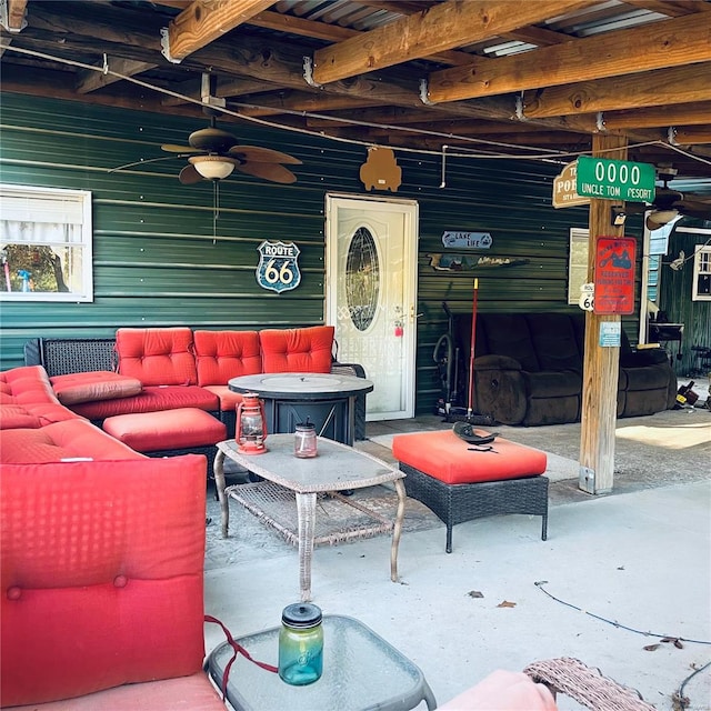 view of patio featuring an outdoor living space and ceiling fan