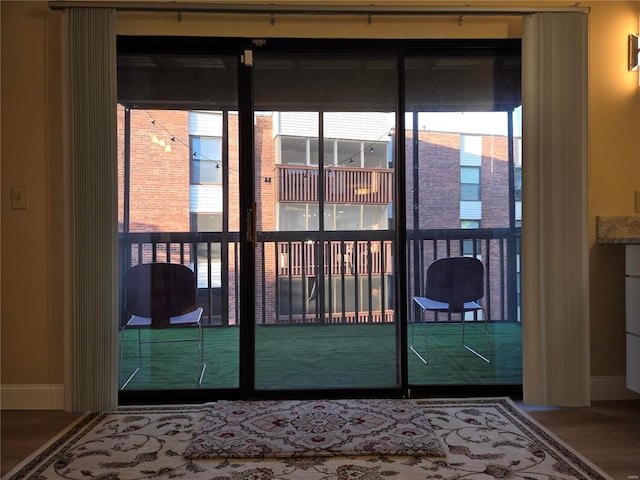 doorway featuring hardwood / wood-style flooring