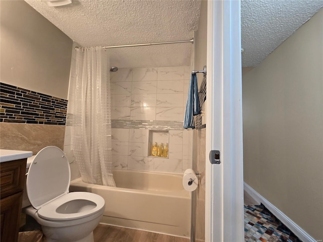 full bathroom with hardwood / wood-style flooring, toilet, shower / bath combination with curtain, vanity, and tile walls