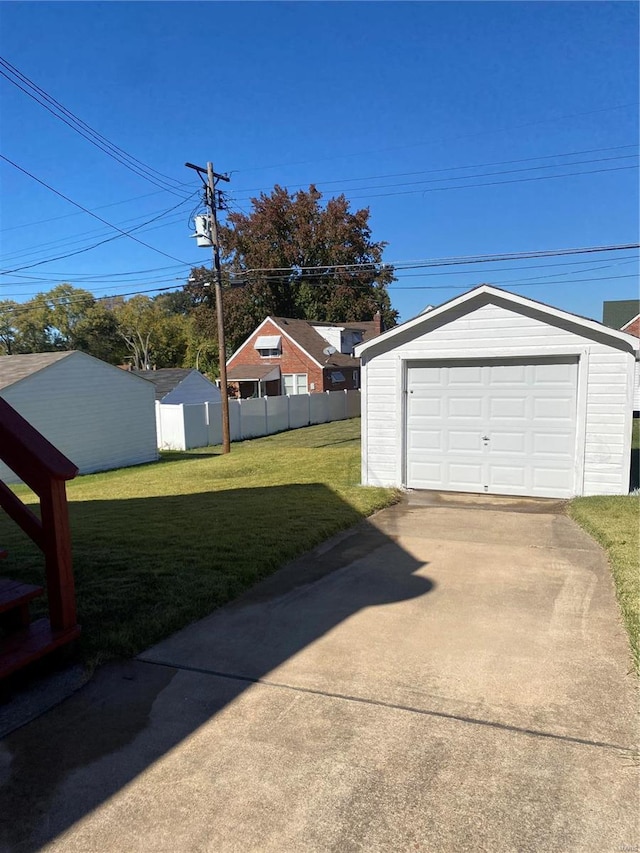 garage with a lawn