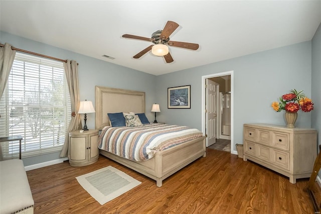 bedroom with hardwood / wood-style flooring and ceiling fan