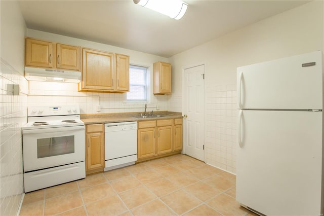 kitchen featuring sink, light tile patterned flooring, white appliances, and light brown cabinets