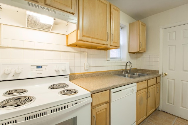 kitchen with backsplash, white appliances, sink, and light tile patterned floors