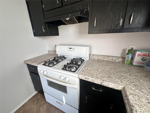 kitchen featuring white gas range oven