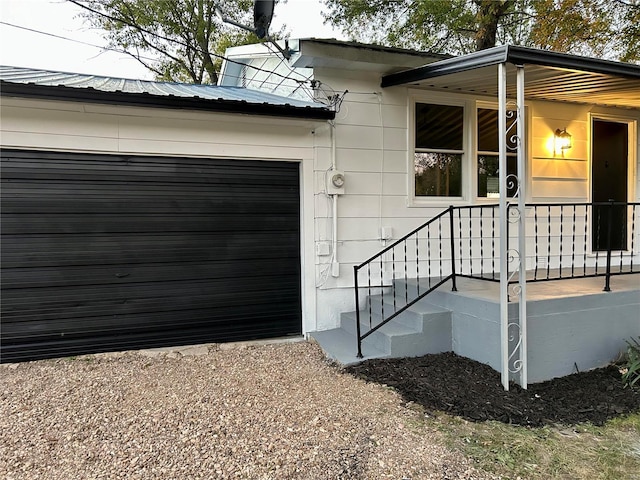 view of side of property featuring a garage