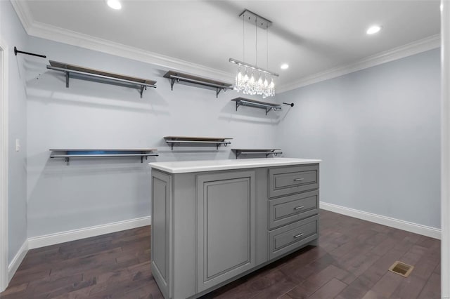 walk in closet featuring dark wood-type flooring