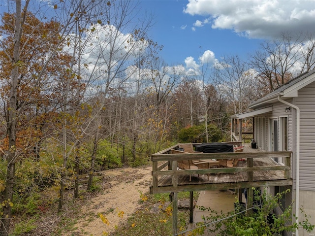 view of yard with a deck