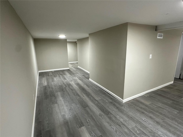 interior space with dark hardwood / wood-style flooring