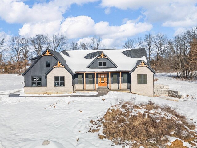 view of front of house featuring covered porch