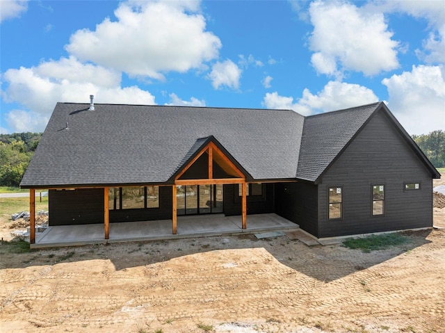 view of front of property featuring a patio