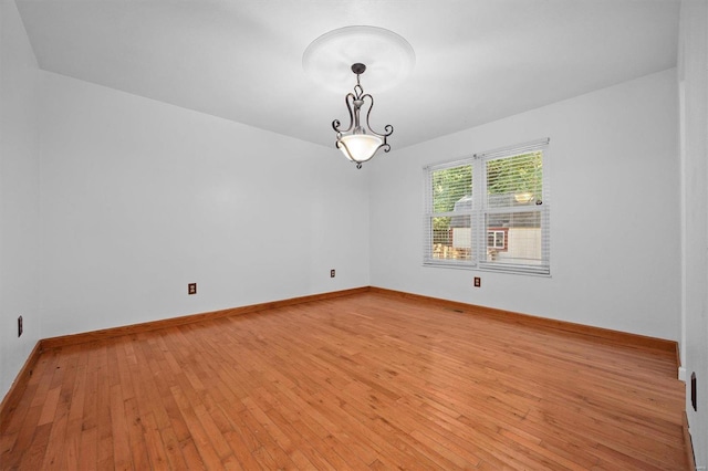 unfurnished room featuring light hardwood / wood-style floors