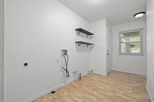 laundry room featuring hookup for an electric dryer, hookup for a washing machine, and gas dryer hookup