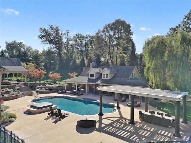 view of swimming pool featuring a patio