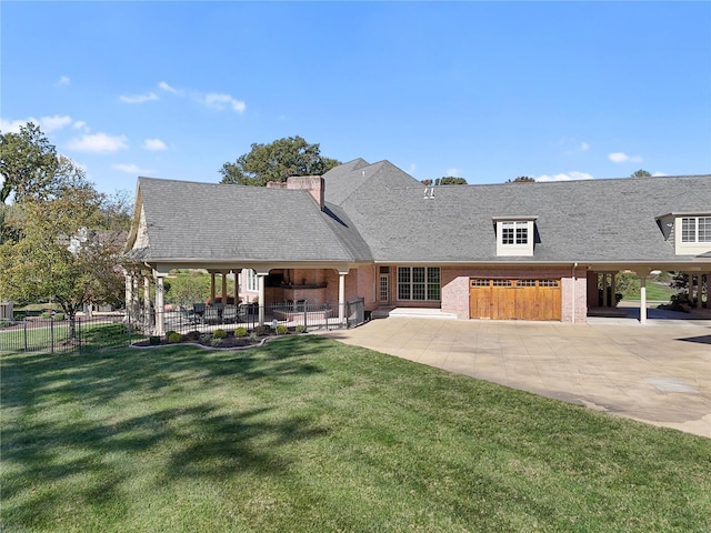 view of front of house featuring a patio and a front lawn