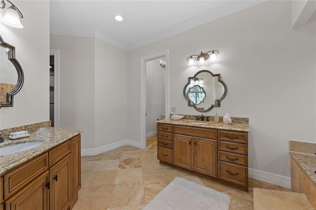 bathroom featuring vanity and ornamental molding