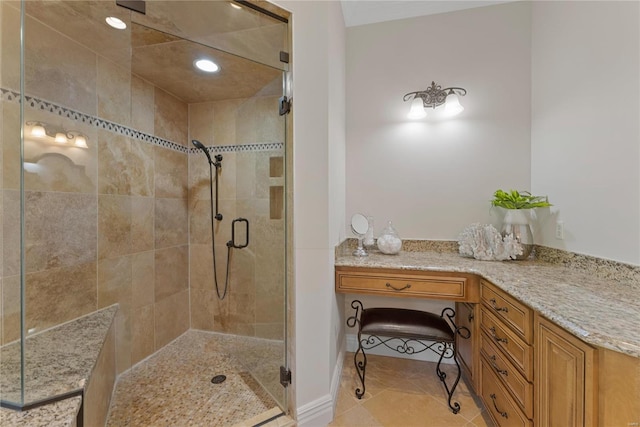 bathroom with tile patterned floors and a shower with door