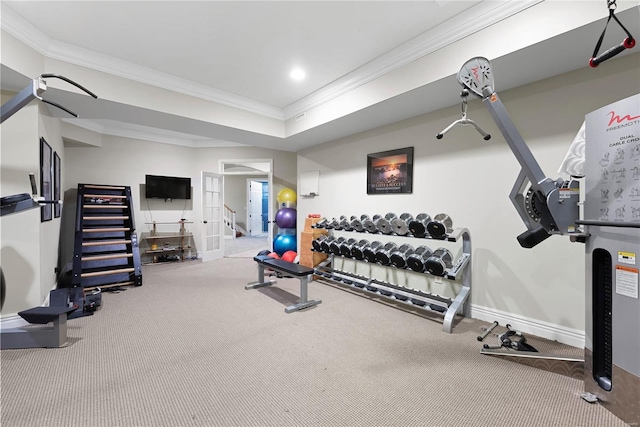 workout room with carpet, ornamental molding, and french doors