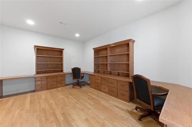 home office featuring light hardwood / wood-style flooring