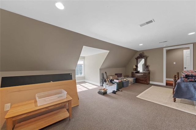 bedroom featuring carpet flooring and lofted ceiling