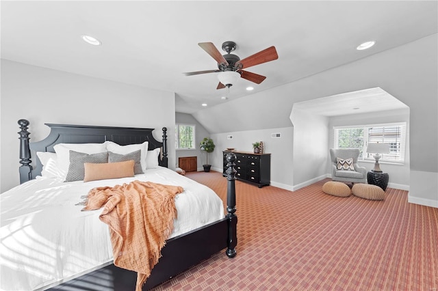 bedroom with carpet, ceiling fan, and lofted ceiling