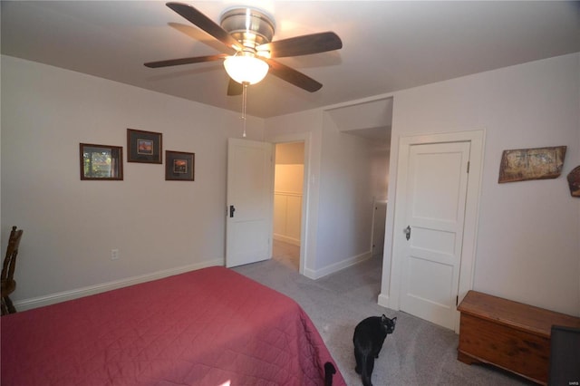 bedroom featuring ceiling fan and light colored carpet