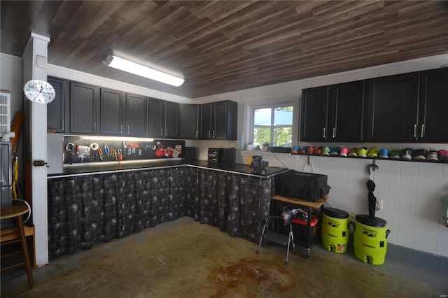 kitchen with concrete floors and wooden ceiling