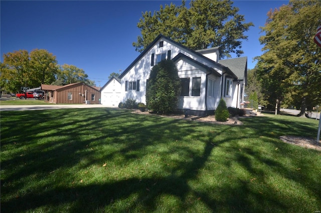 view of home's exterior with a lawn