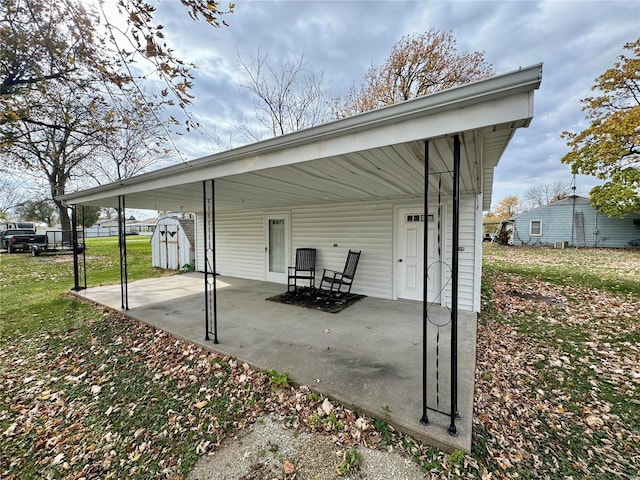 view of patio featuring a carport